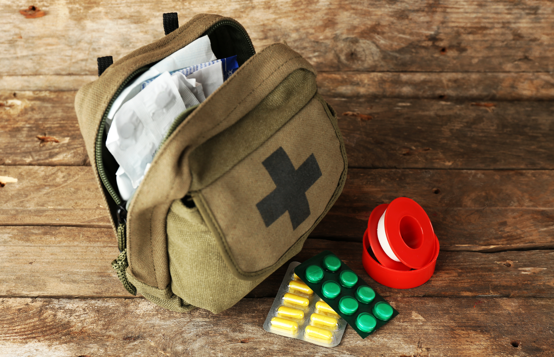 What essential first aid items should I pack?